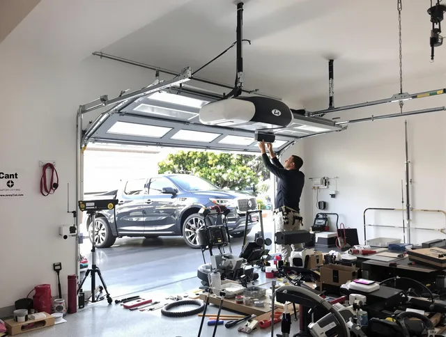 Rosemead Garage Door Repair specialist installing smart garage door opener system in Rosemead home